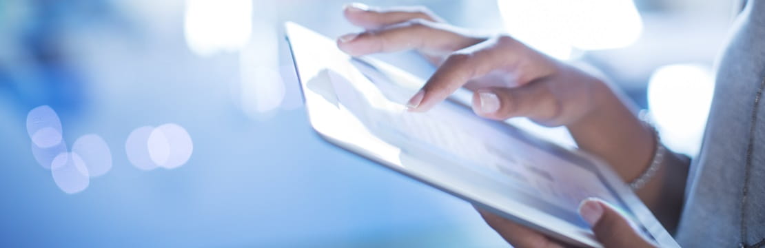 Close up businesswoman using digital tablet